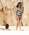 Nina_Dobrev_-_Seen_with_Boyfriend_while_Swimming_outside_Hotel_Eden_Roc_in_Cannes_France_01.jpg