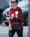 Nina_Dobrev_-_Shows_off_her_fit_figure_for_a_Starbucks_coffee_run_in_West_Hollywood2C_CA_13.jpg