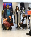 Nina_Dobrev_-_catches_a_flight_out_of_LAX_with_her_parents_in_Los_Angeles2C_CA_11.jpg