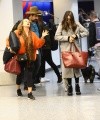 Nina_Dobrev_-_catches_a_flight_out_of_LAX_with_her_parents_in_Los_Angeles2C_CA_13.jpg