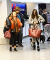 Nina_Dobrev_-_catches_a_flight_out_of_LAX_with_her_parents_in_Los_Angeles2C_CA_14.jpg
