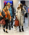 Nina_Dobrev_-_catches_a_flight_out_of_LAX_with_her_parents_in_Los_Angeles2C_CA_18.jpg