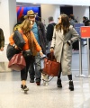 Nina_Dobrev_-_catches_a_flight_out_of_LAX_with_her_parents_in_Los_Angeles2C_CA_19.jpg