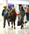 Nina_Dobrev_-_catches_a_flight_out_of_LAX_with_her_parents_in_Los_Angeles2C_CA_21.jpg