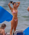 Nina_Dobrev_-_took_in_some_volleyball_before_heading_into_the_Pacific_for_some_fun_with_Grant_Mellon_and_friends_in_Maui_August_31_14.jpg