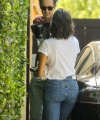 Nina_Dobrev_-_wears_high_waisted_jeans_to_visit_a_friend_with_newly_adopted_puppy_in_West_Hollywood_04.jpg