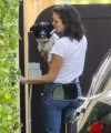 Nina_Dobrev_-_wears_high_waisted_jeans_to_visit_a_friend_with_newly_adopted_puppy_in_West_Hollywood_23.jpg