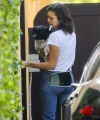 Nina_Dobrev_-_wears_high_waisted_jeans_to_visit_a_friend_with_newly_adopted_puppy_in_West_Hollywood_26.jpg