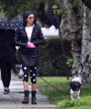 Nina_Dobrev_steps_out_and_braves_the_rain_to_take_her_dog_Maverick_out_for_a_walk_near_her_Los_Angeles_home_05.jpg