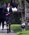 Nina_Dobrev_steps_out_and_braves_the_rain_to_take_her_dog_Maverick_out_for_a_walk_near_her_Los_Angeles_home_08.jpg