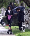 Nina_Dobrev_steps_out_and_braves_the_rain_to_take_her_dog_Maverick_out_for_a_walk_near_her_Los_Angeles_home_09.jpg