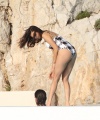 Nina_Dobrev_-_Seen_with_Boyfriend_while_Swimming_outside_Hotel_Eden_Roc_in_Cannes_France_04.jpg